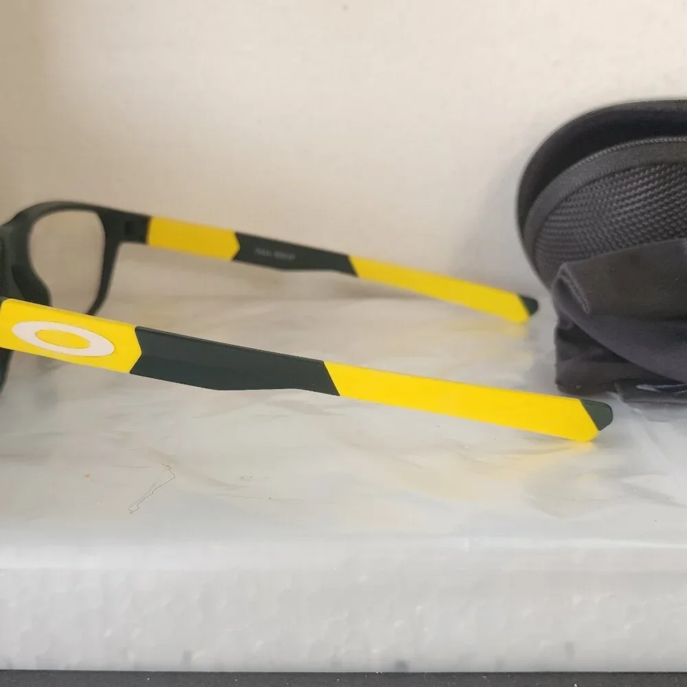 Oregon Ducks colored Oakley NWOT Tail whip satin finish green & yellow EYEGLASS